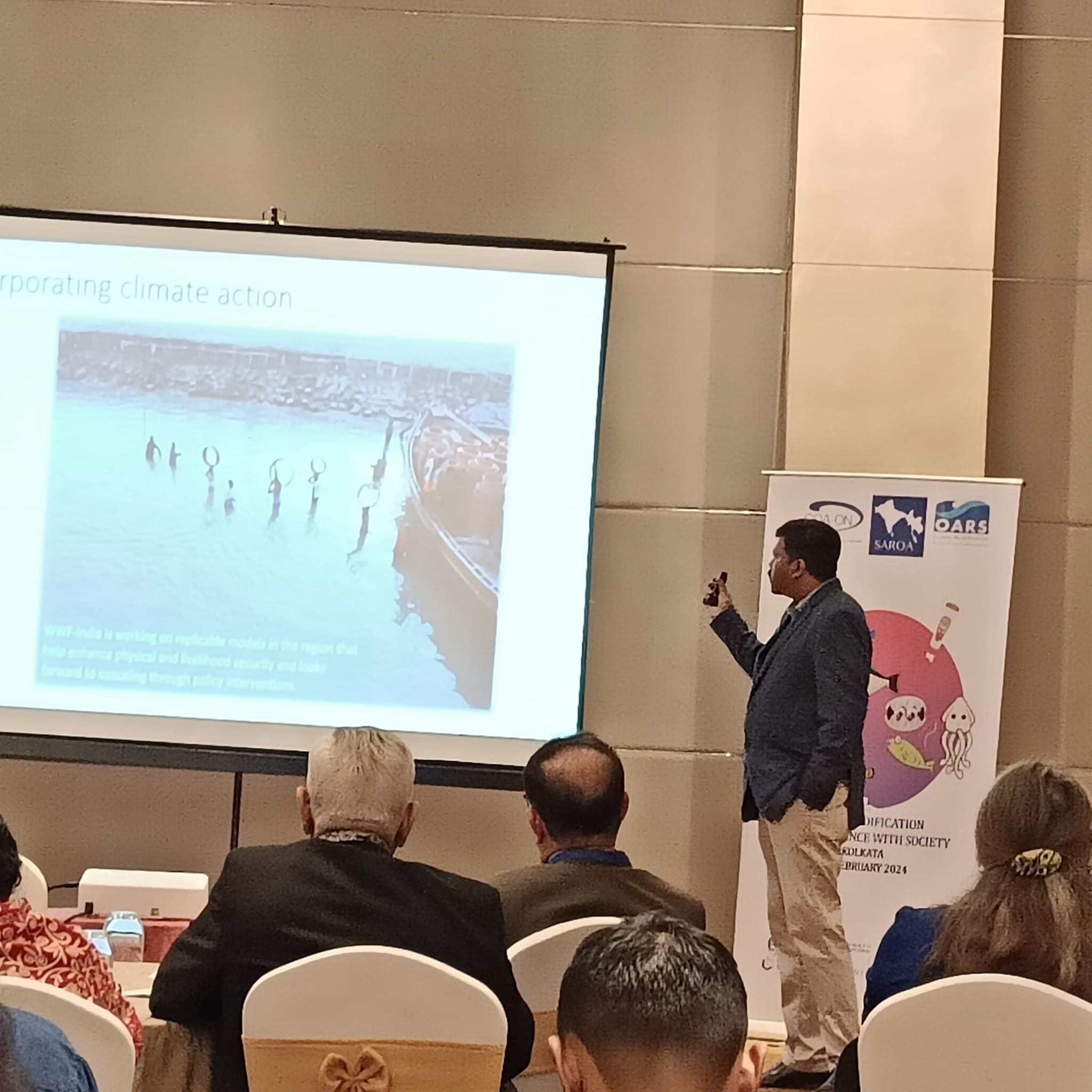 Dr. Paromit Chatterjee presenting climate and biodiversity work at a professional forum