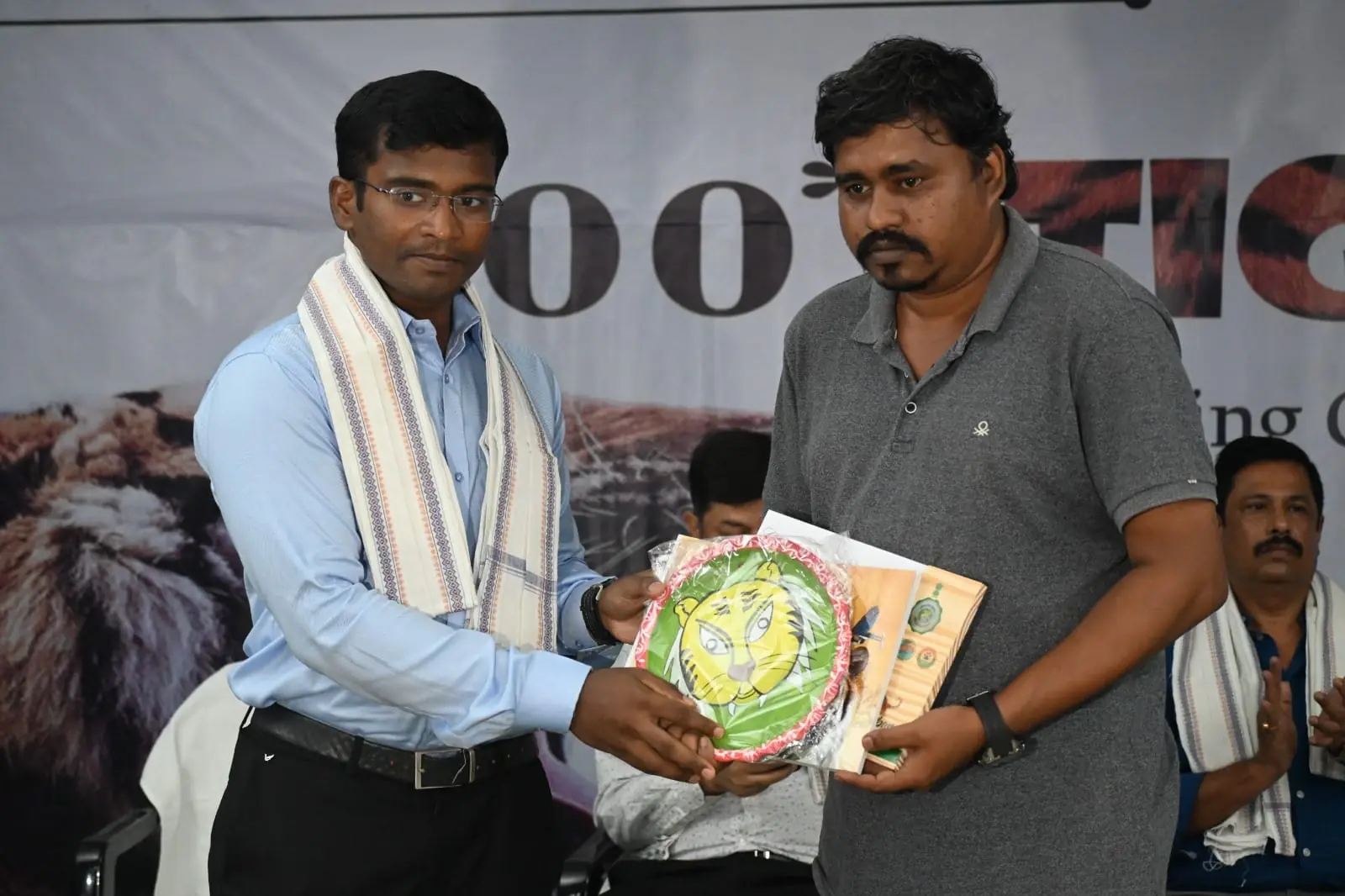 Receiving a wildlife-themed recognition at an event